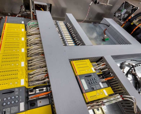 Control panel unit showing custom cable and wiring